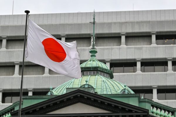 Bank of Japan keeps benchmark interest rate steady as it treads cautiously
