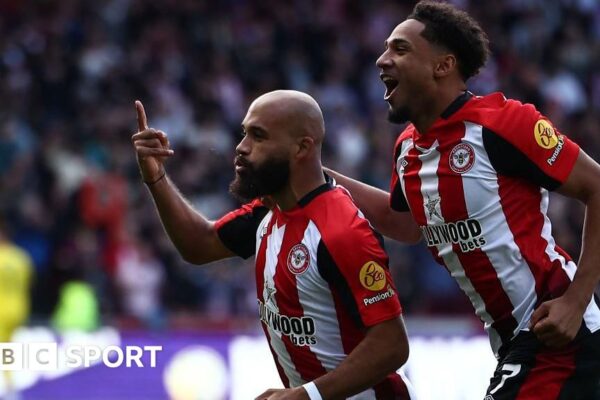 Bryan Mbeumo holds up a finger in celebration