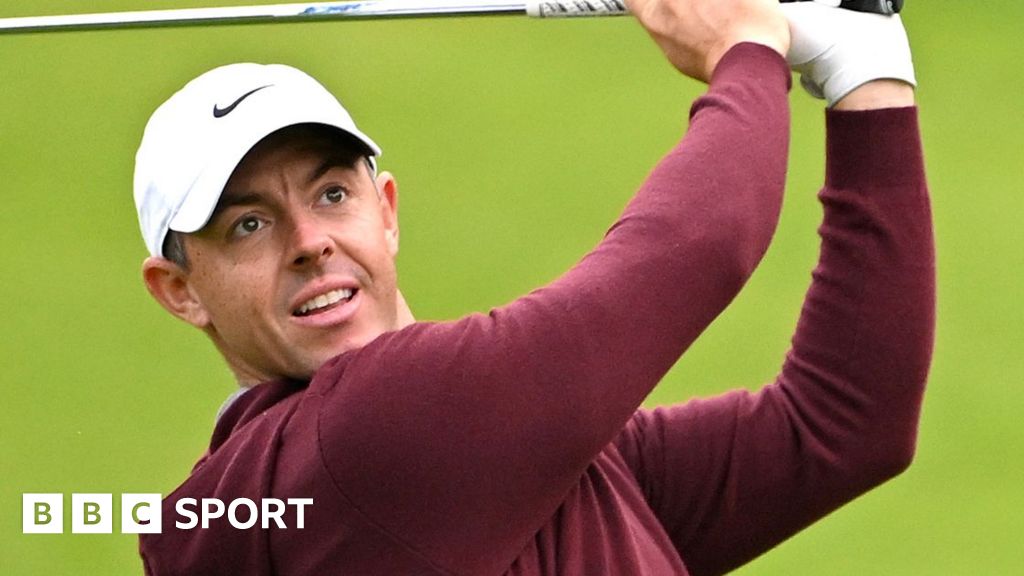 Rory McIlroy in a cream jumper