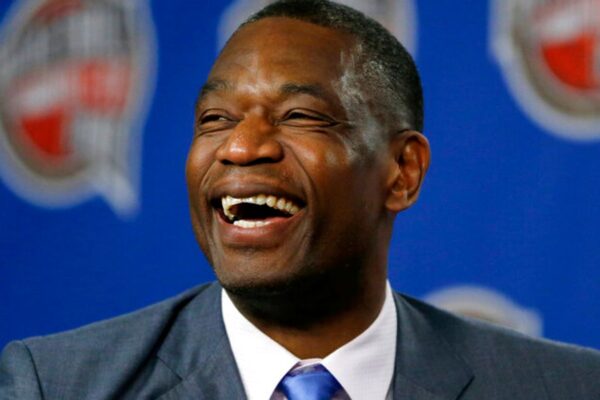 FILE - Former NBA basketball player Dikembe Mutombo laughs during a news conference announcing him as one of the 12 finalists of this year's hall of fame class during an event ahead of the NBA All Star basketball game, on Feb. 14, 2015, in New York. Mutombo is undergoing treatment in Atlanta for a brain tumor, the NBA announced Saturday, OCt. 15, 2022, (AP Photo/Julio Cortez)