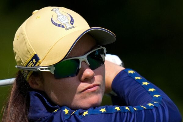 Europe's Leona Maguire hits from the third tee during a Solheim Cup golf tournament singles match at the Robert Trent Jones Golf Club, Sunday, Sept. 15, 2024, in Gainesville, Va. (AP Photo/Chris Szagola)