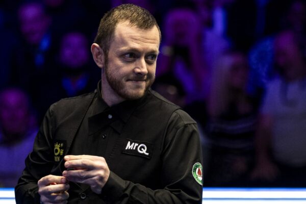 Mark Allen before potting the black and making a 147 in his quarter final match against Mark Selby (not in picture) during day six of the MrQ Masters at Alexandra Palace, London. Picture date: Friday January 12, 2024.