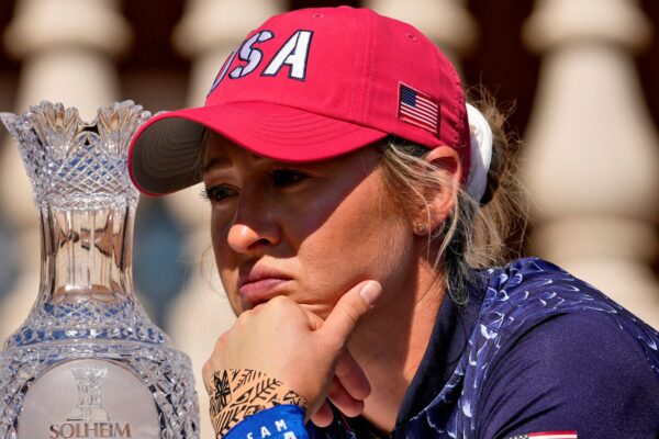 United States' Nelly Korda waits for a team photograph prior to the start of the Solheim Cup golf tournament at the Robert Trent Jones Golf Club, Tuesday, Sept. 10, 2024, in Gainesville, Va. (AP Photo/Matt York)