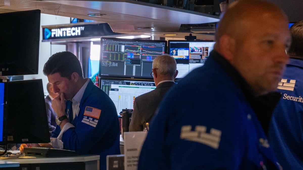 Dow Jones notches new record, chip stocks leap higher