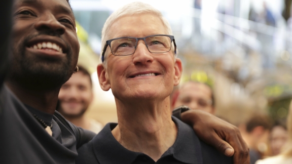 Apple CEO Tim Cook pledges to increase investment in China