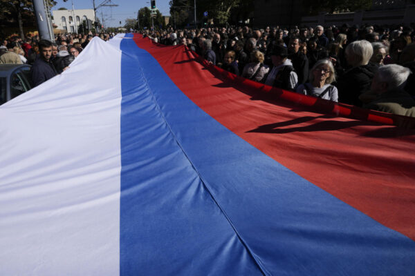 Serbia's president talks with Putin and vows he'll never impose sanctions on Russia