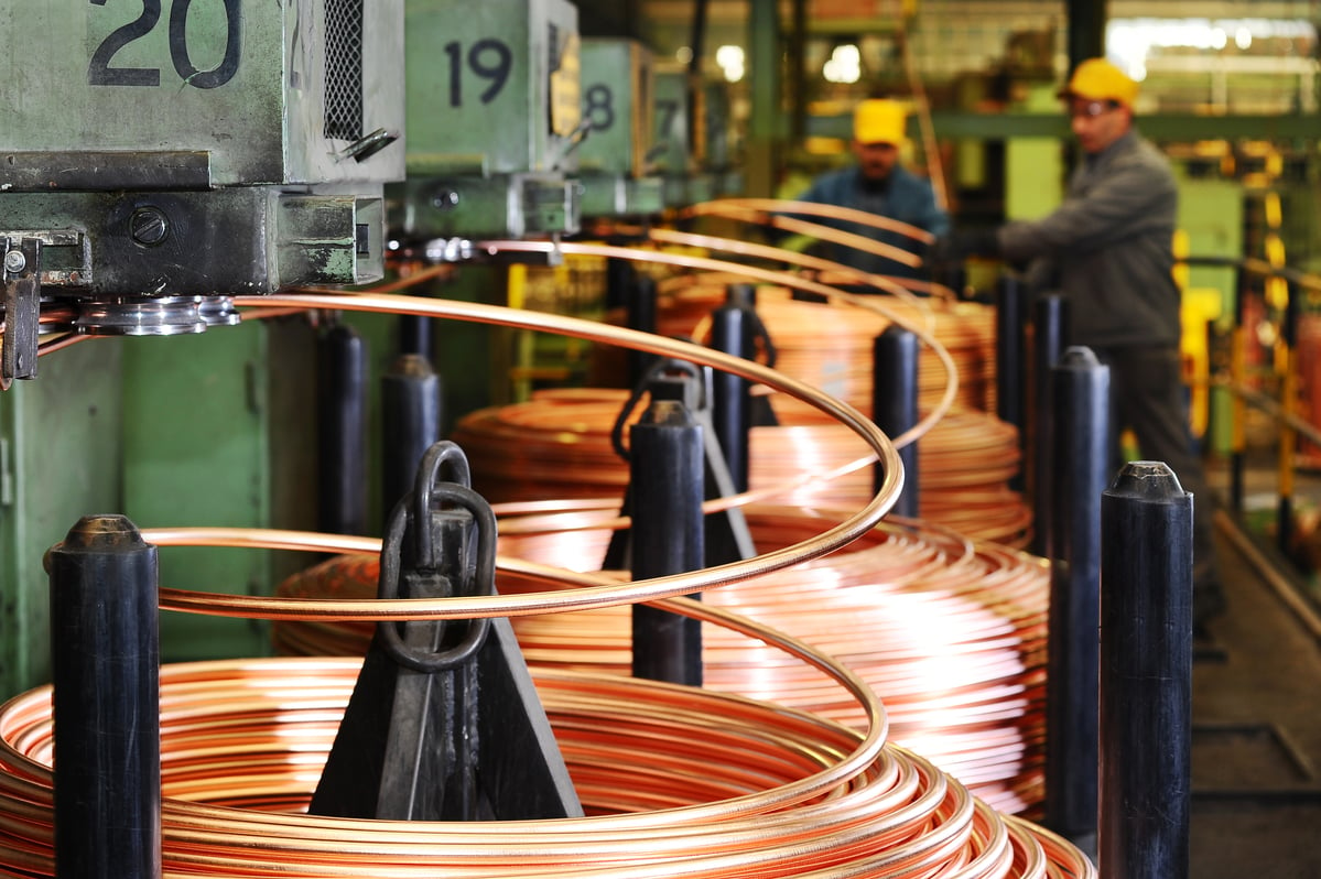 Spools of copper tubing in a factory.