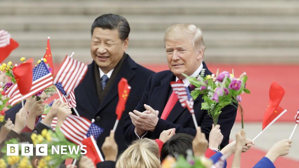 Then-US president Donald Trump and Chinese President Xi Jinping at a ceremony in Beijing in 2017.