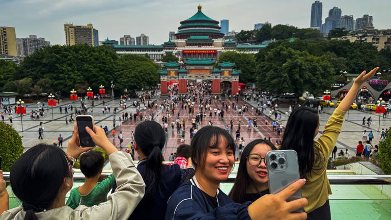 Investors went wild for China during its big holiday. But Chinese shoppers showed little of that optimism