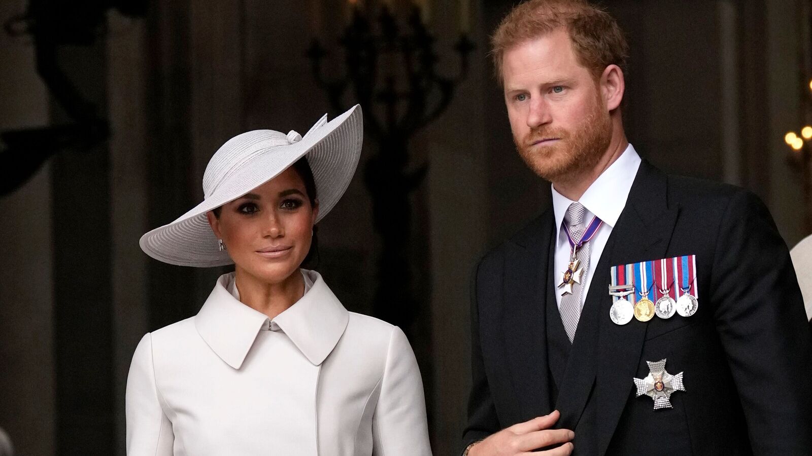 Prince Harry and Meghan Markle, Duke and Duchess of Sussex leave after a service of thanksgiving for the reign of Queen Elizabeth II at St Paul's Cathedral in London, Friday, June 3, 2022 on the second of four days of celebrations to mark the Platinum Jubilee.