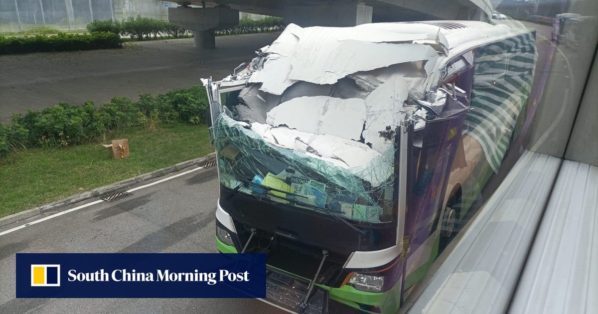 Hong Kong tour bus hits overpass, leaving driver injured