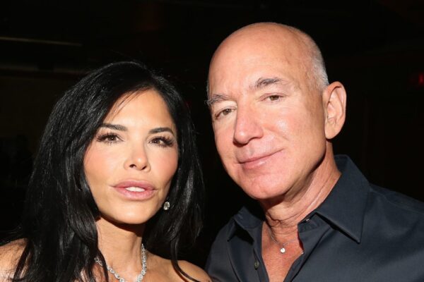 Jeff Bezos' fiancée Lauren Sanchez's towering sons Evan and Nikko appear in sun-soaked photo during family trip