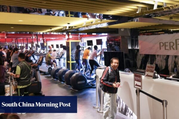 Hong Kong minister urges former Physical gym staff to be vigilant over new investor contracts