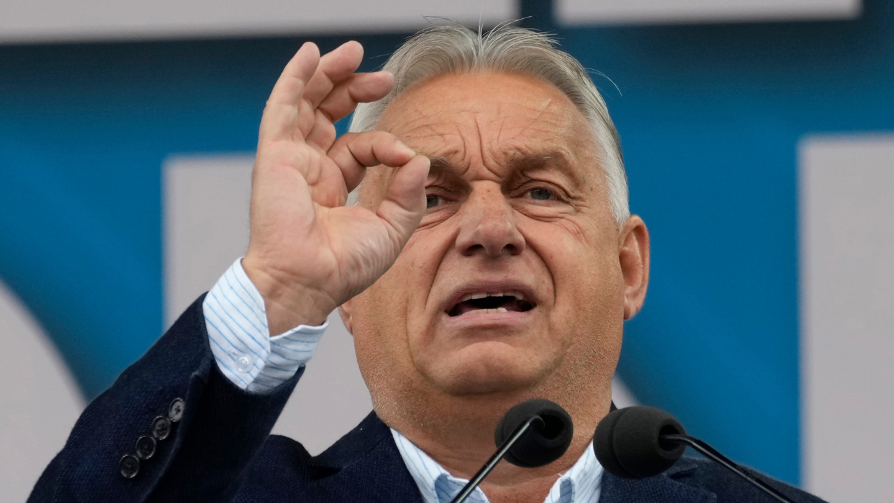 Hungary’s Orban interrupted by activist during EU presidency news conference