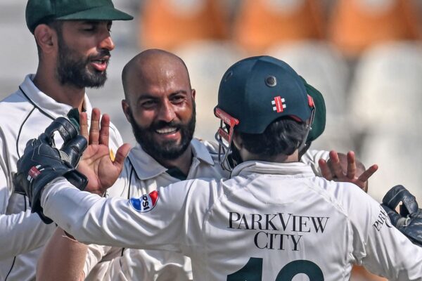Pakistan's Sajid Khan (2L) celebrates with teammates after taking the wicket of England's Ollie Pope during the fourth day of the second Test cricket match between Pakistan and England at the Multan Cricket Stadium in Multan on October 18, 2024. (Photo by Farooq NAEEM / AFP)