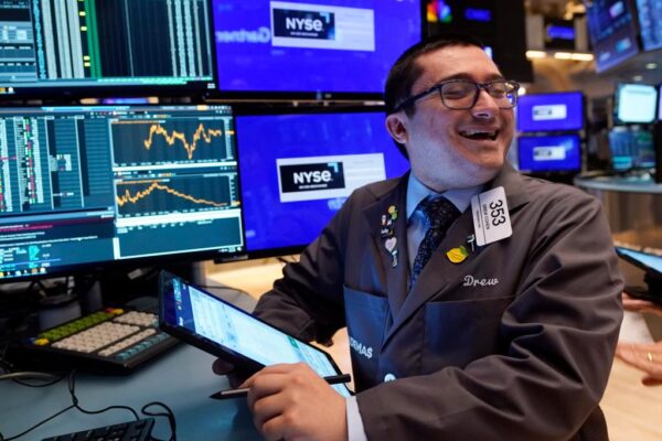 Dow leaps over 400 points, S&P 500 hits all-time high