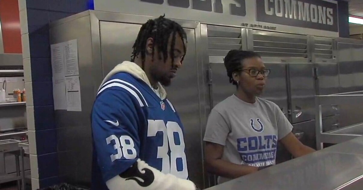 Colts players serve students meals at school to promote healthy eating