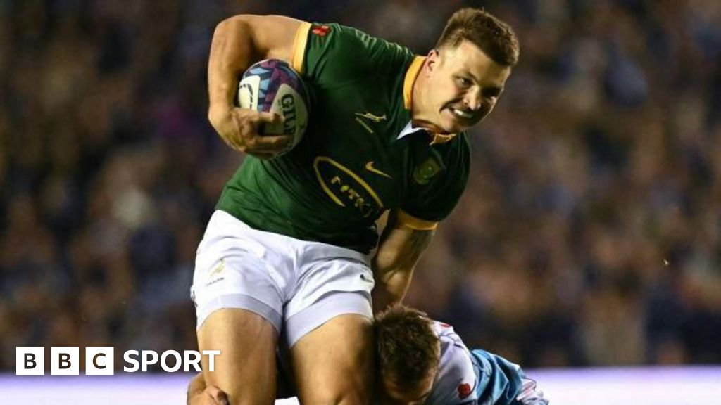Andre Esterhuizen carries the ball against Scotland
