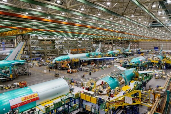 Boeing again raises offer to end strike, union to vote Monday