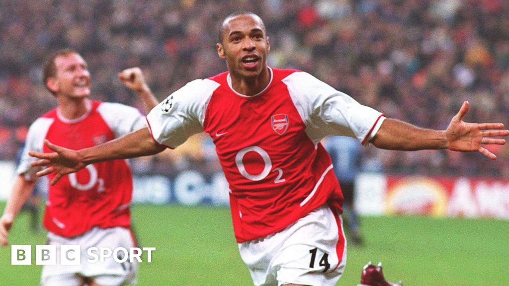 Arsenal's Thierry Henry celebrates with his arms held out