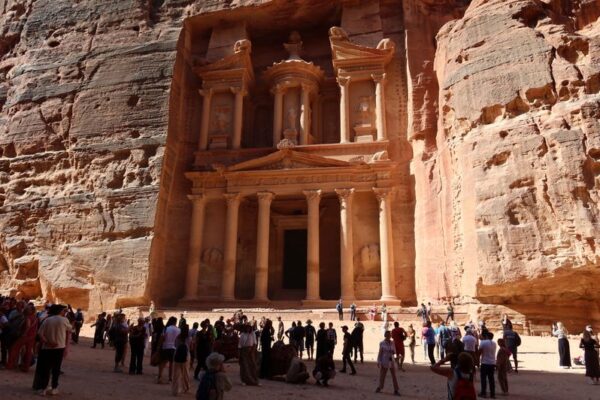 Visitors gather at the treasury site in the ancient city of Petra