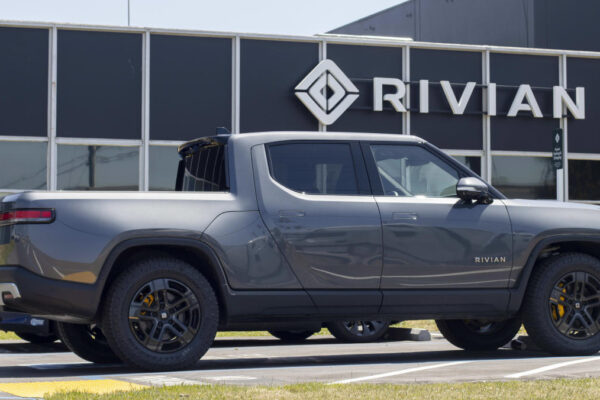 Rivian gains on reported conditional settlement with Tesla