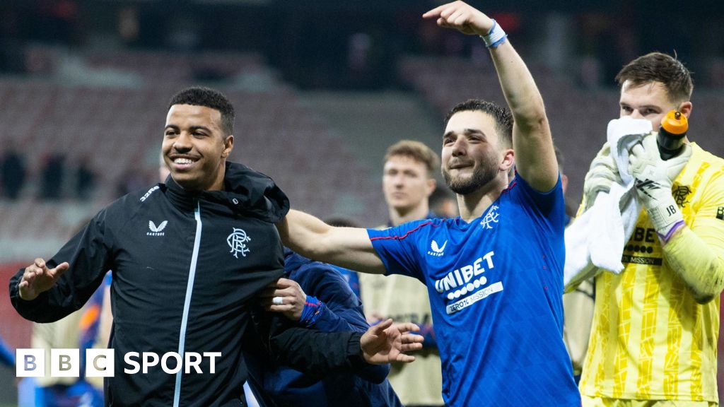 Rangers' Hamza Igamane (L) and Nicolas Raskin celebrate at full time during a UEFA Europa League 2024/25 League Phase MD5 match between OGC Nice and Rangers at the Stade de Nice