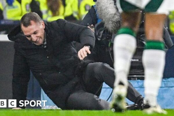 Brendan Rodgers lying on the Hampden turf