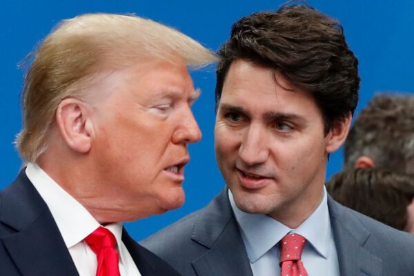 U.S. President Donald Trump, left, and Canadian Prime Minister Justin Trudeau talk prior to a NATO round table meeting at The Grove hotel and resort in Watford, Hertfordshire, England, Dec. 4, 2019. (AP Photo/Frank Augstein, File)