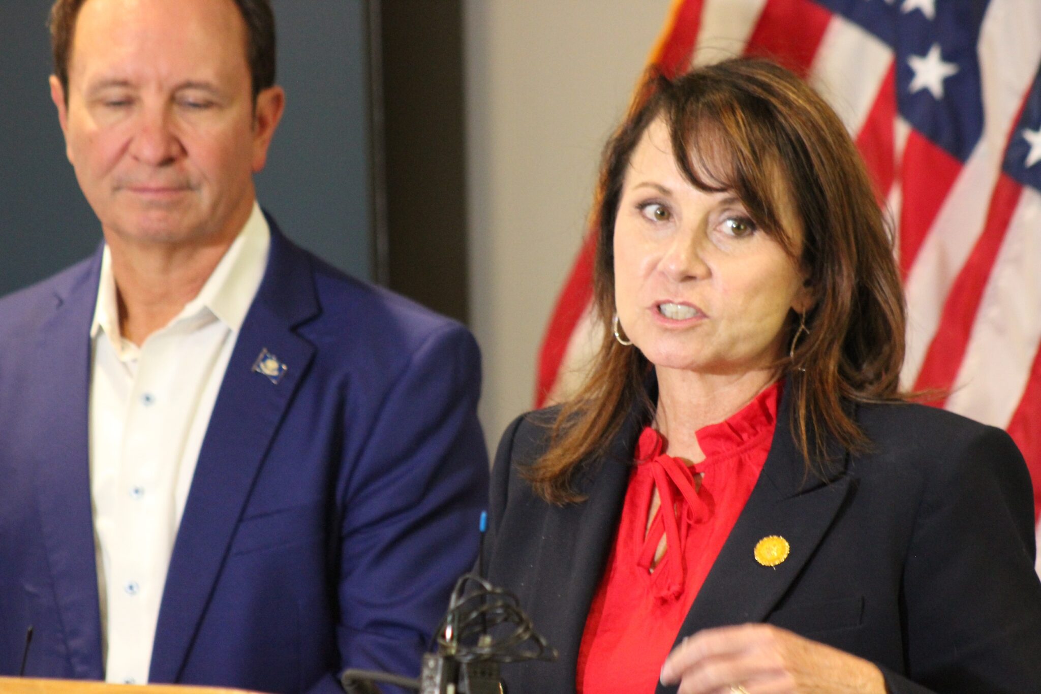 Louisiana Attorney General Liz Murrill and Gov. Jeff Landry speaking at press conference at Denka plant