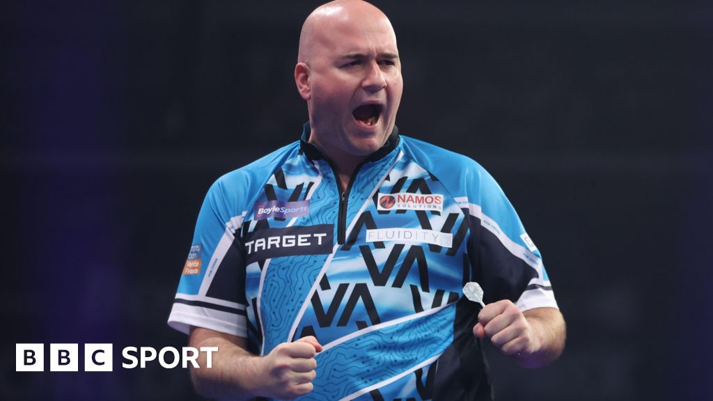 Rob Cross celebrates his win over Peter Wright