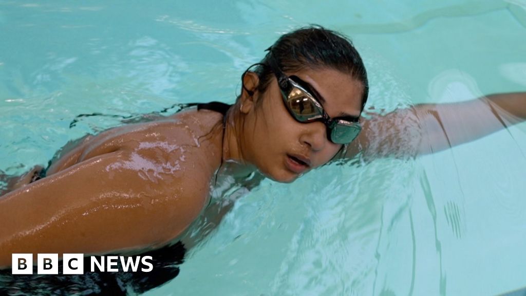 Olympic swimmer helps trains presenter