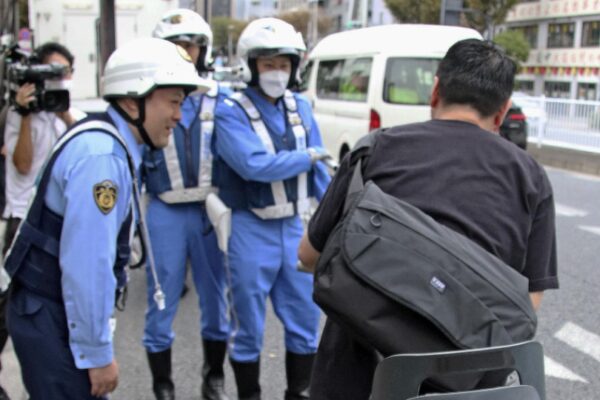 Japan law to punish cyclists for phone use, riding drunk takes effect