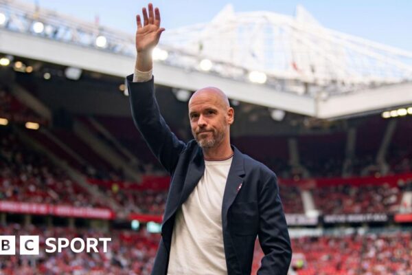 Erik ten Hag waves to the crowd