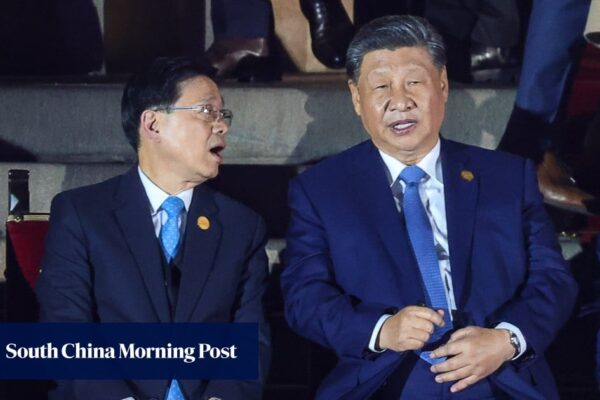 Xi Jinping gives encouragement to Hong Kong leader in talks at Apec summit sidelines