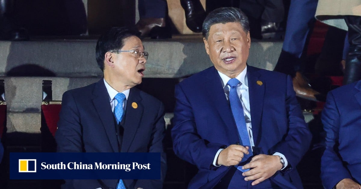 Xi Jinping gives encouragement to Hong Kong leader in talks at Apec summit sidelines