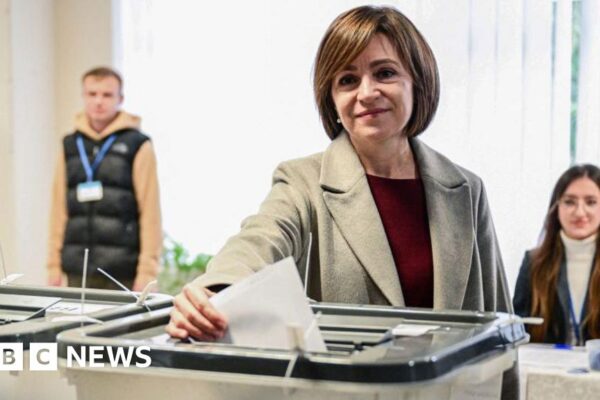 Moldova's pro-EU leader in tight run-off as Russia denies meddling