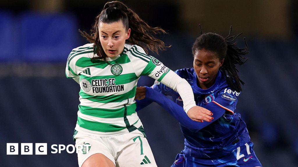 Amy Gallacher of Celtic runs with the ball while under pressure from Oriane Jean-Francois