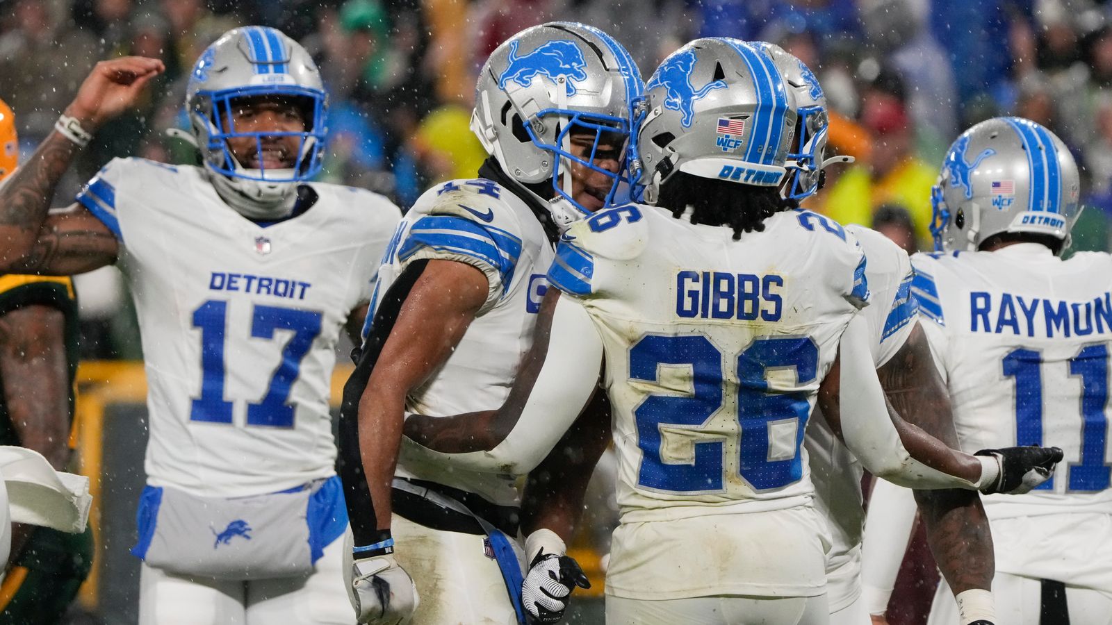 Detroit Lions running back Jahmyr Gibbs (26) celebrates his rushing touchdown with teammates during the second half of an NFL football game against the Green Bay Packers, Sunday, Nov. 3, 2024, in Green Bay, Wis.