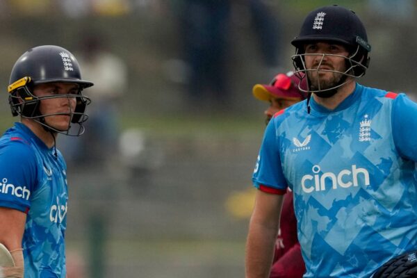Sir Alastair Cook calls England’s ODI batting ‘confused’ as ‘lack of experience’ leads to collapse vs West Indies | Cricket News England's Jamie Overton, right, and Sam Curran look at the scoreboard during the first ODI cricket match against West Indies at Sir Vivian Richards Ground in North Sound, Antigua and Barbuda, Thursday, Oct. 31, 2024. (AP Photo/Ricardo Mazalan)