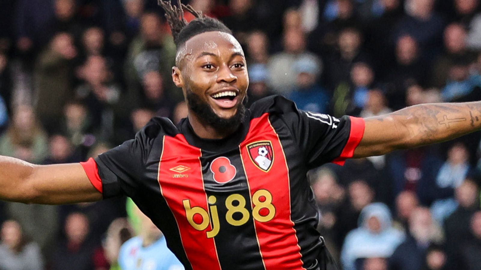 Antoine Semenyo celebrates after opening the scoring for Bournemouth against Man City