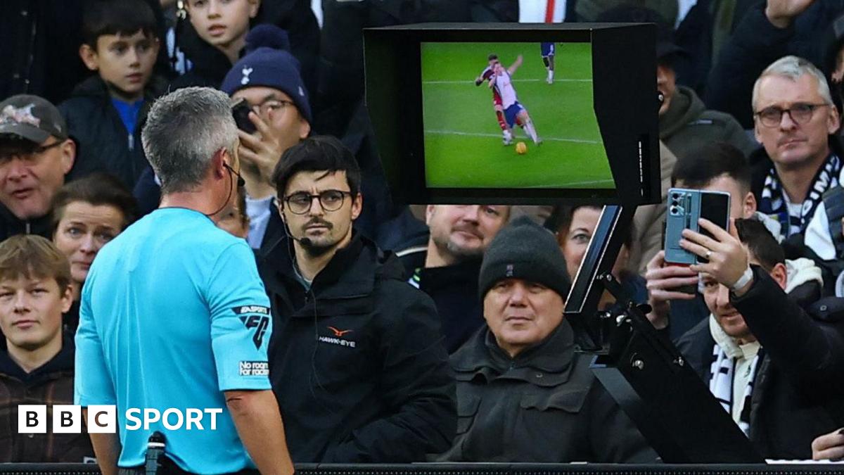 Referee checking a decision on the VAR monitor