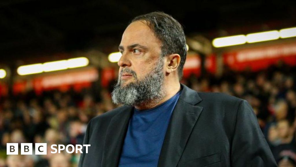 Evangelos Marinakis wearing a suit jacket