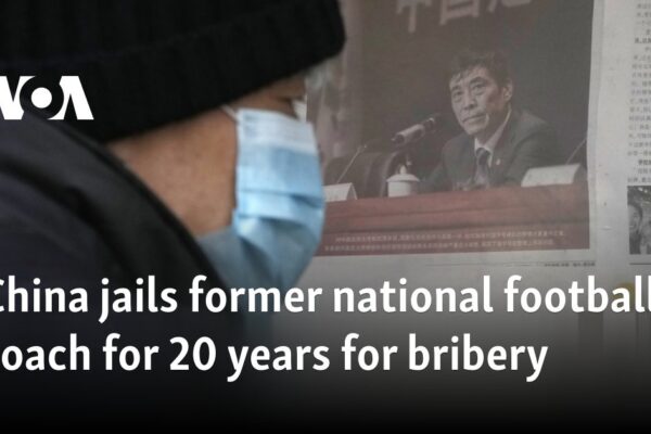 China jails former national football coach for 20 years for bribery