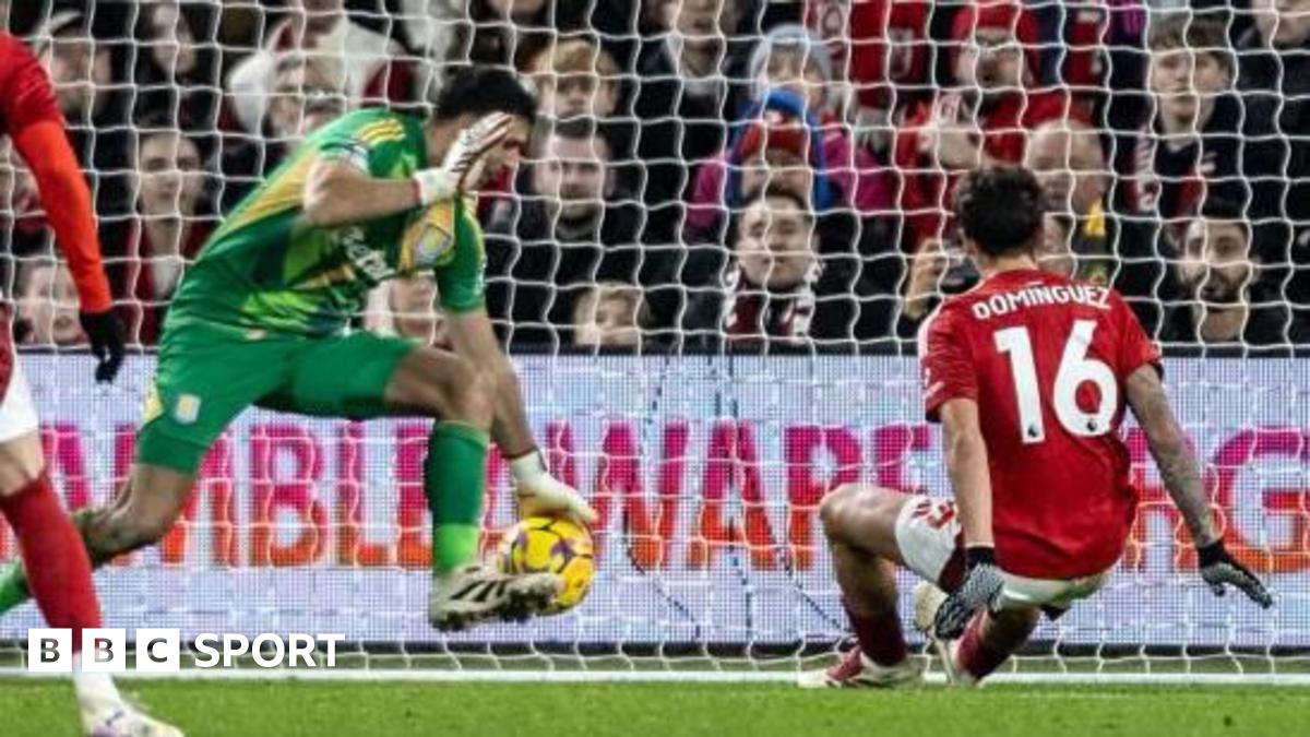 Aston Villa's Emiliano Martinez saves from Nottingham Forest's Nicolas Dominguez