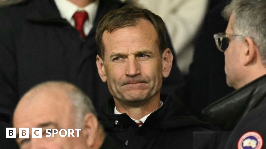 Dan Ashworth frowns in the crowd at Old Trafford