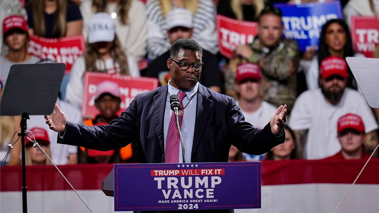 Herschel Walker speaks during a campaign rally at Atrium Health Amphitheater for Republican presidential nominee former President Donald Trump, Nov. 3, 2024, in Macon, Ga. (AP Photo/Mike Stewart)