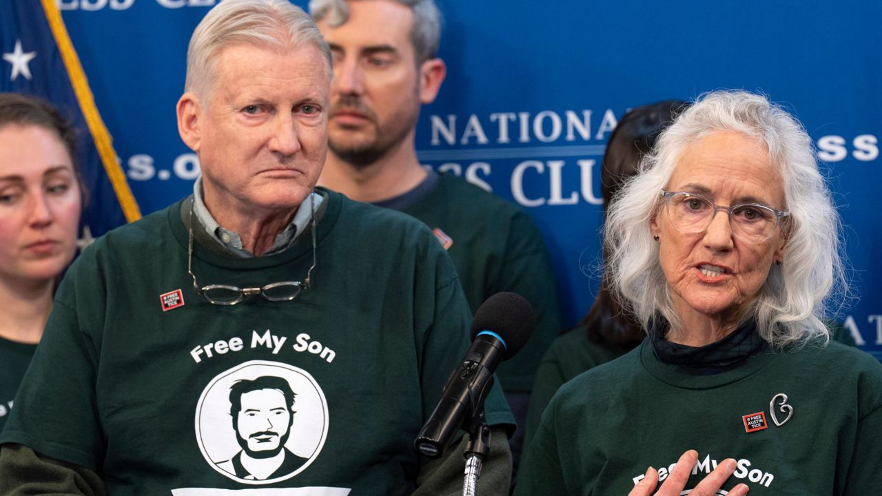 Marc Tice, left, and Debra Tice, the parents of Austin Tice, a journalist who was kidnapped in Syria, update the media about their son's condition as they continue to push for his release, Friday, Dec. 6, 2024, during a news conference at the National Press Club in Washington. (AP Photo/Jacquelyn Martin)