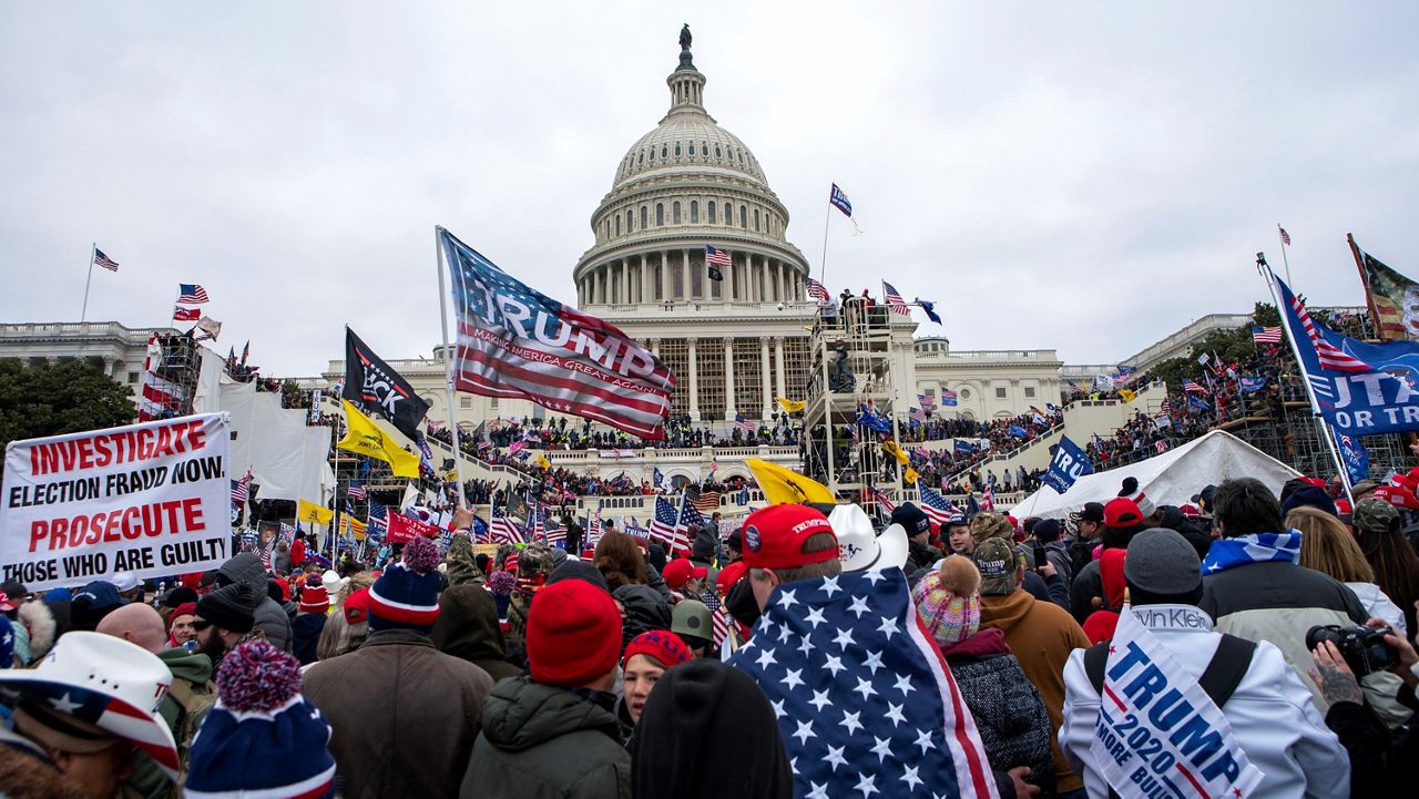 Rioters loyal to President Donald Trump rally at the U.S. Capitol in Washington, Jan. 6, 2021. (AP Photo/Jose Luis Magana, File)