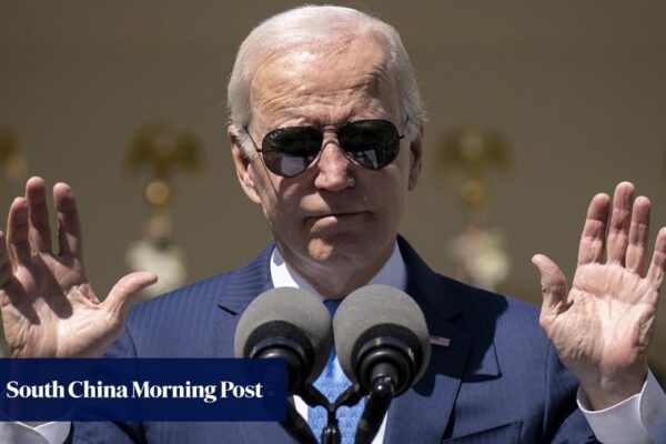 Biden signs Pentagon budget bill that extends sanctions on Hong Kong officials